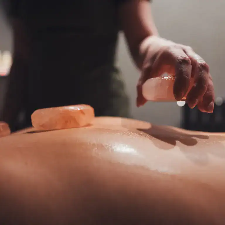 Handcrafting Himalayan salt stone massage at The Ro Hotel.