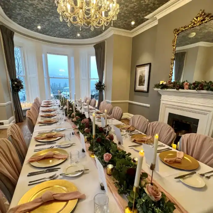 Elegant dining room setup at The Ro Hotel for special events and gatherings.
