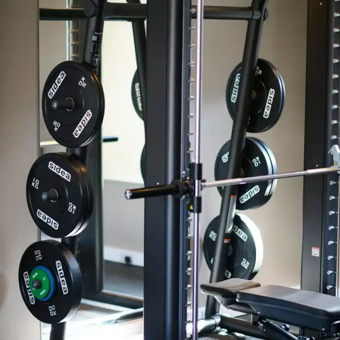 Modern gym equipment at The Ro Hotel, perfect for fitness enthusiasts.