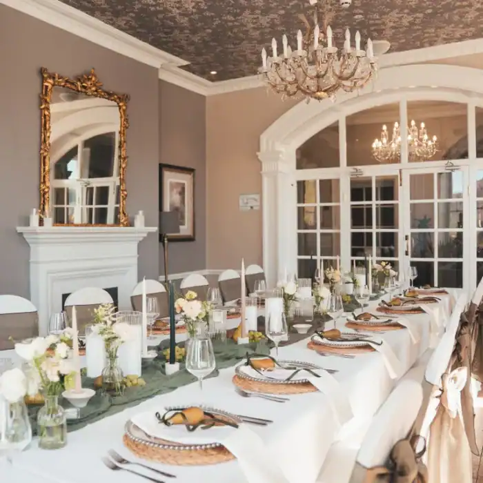 Elegant hotel dining room at The Ro Hotel with luxurious chandeliers and sophisticated decor for special events.