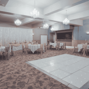 Elegant event space at The Ro Hotel with chandeliers and stylish decor for special occasions.